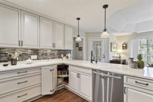 White kitchen with silver dishwasher