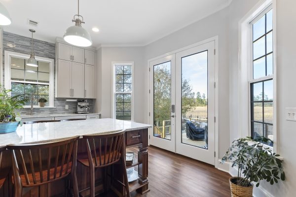 custom kitchen remodel with large island and cabinets