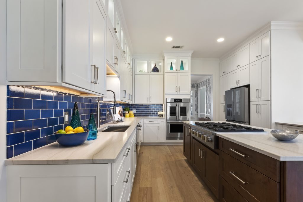 Kitchen Remodel Case Study - Savannah blue and white kitchen remodel with brown kitchen island