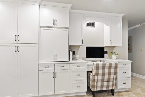 kitchen coffee station with custom desk and cabinets