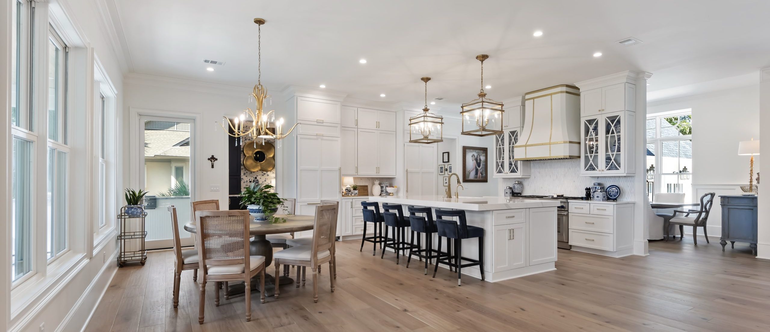 custom white kitchen with breakfast nook
